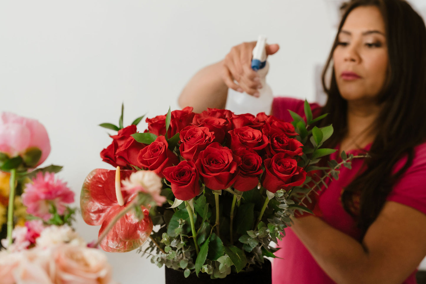 Crimson Blush – Roses & Carnations in Red Glass Vase