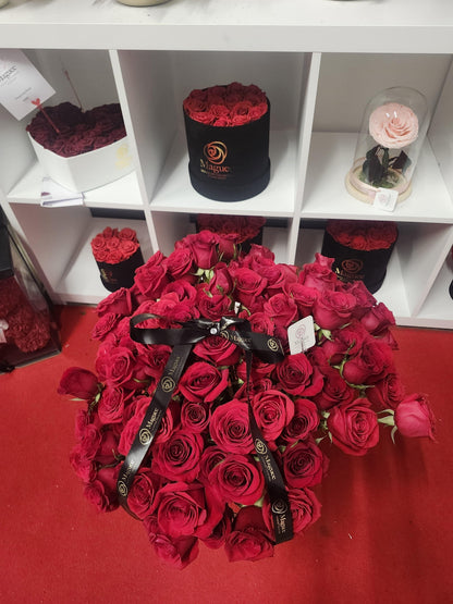 Long Stem Roses in Glass Vase